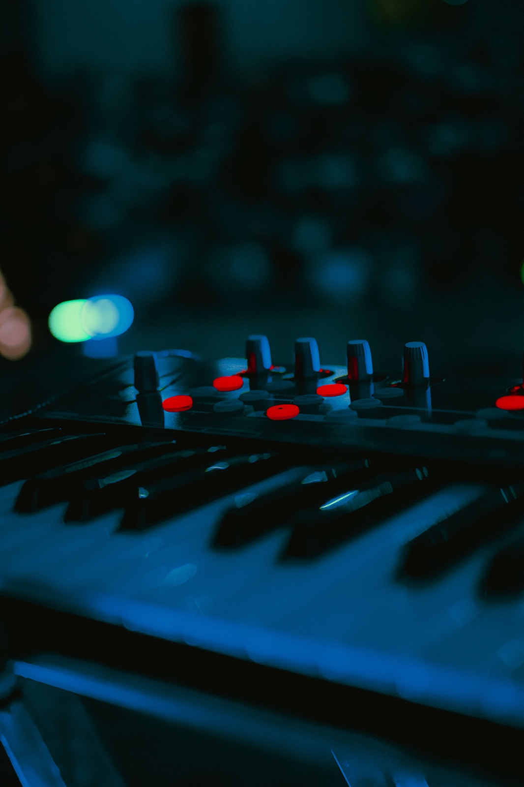 Synthesizer keybed with glowing controls